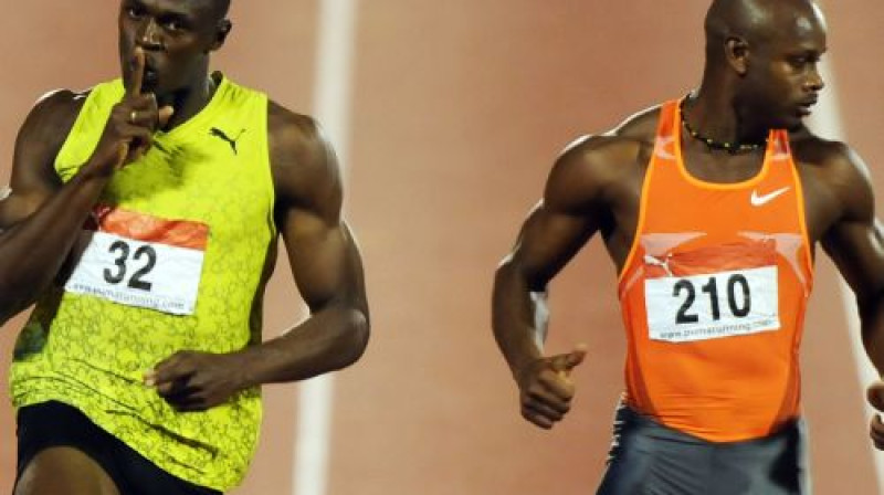 Juseins Bolts un Asafa Pauels
Foto: AFP