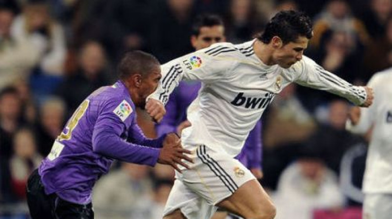 Ronaldu sitiens "Malaga" spēlētājam
Foto: AP/Scanpix
