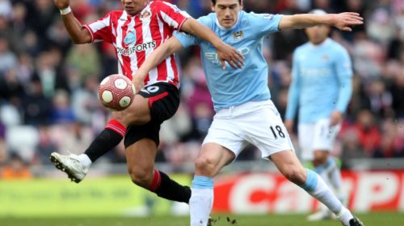 Garets Barijs (pa labi)
Foto: AP/Scanpix