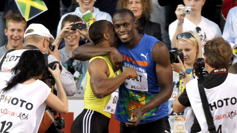 Useins Bolts apsveic Taisonu Geju pēc finiša
Foto: AFP/Scanpix