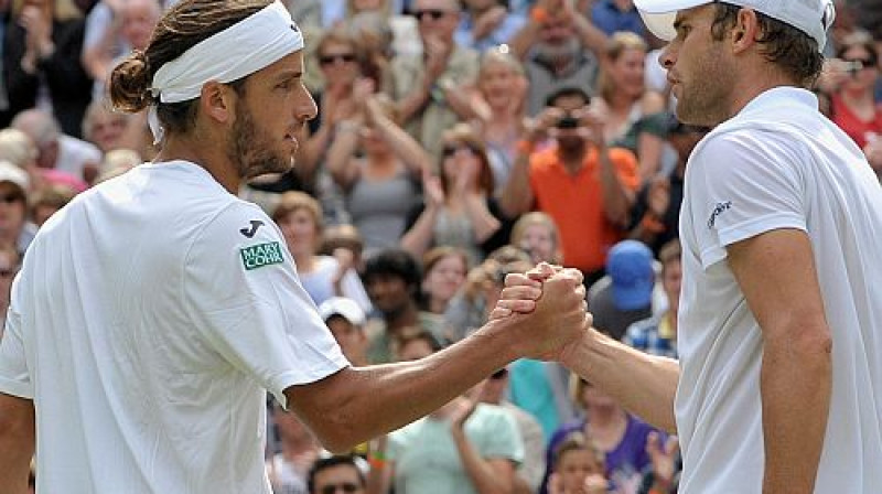 Felisiano Lopess un Endijs Rodiks
Foto: AFP/Scanpix