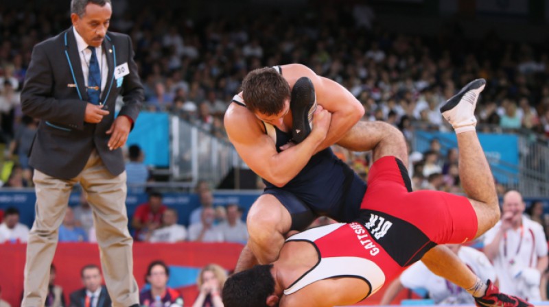 Armands Zvirbulis uzbrūk pretiniekam Londonas olimpisko spēļu ceturtdaļfinālā 
Foto: AFP / Scanpix