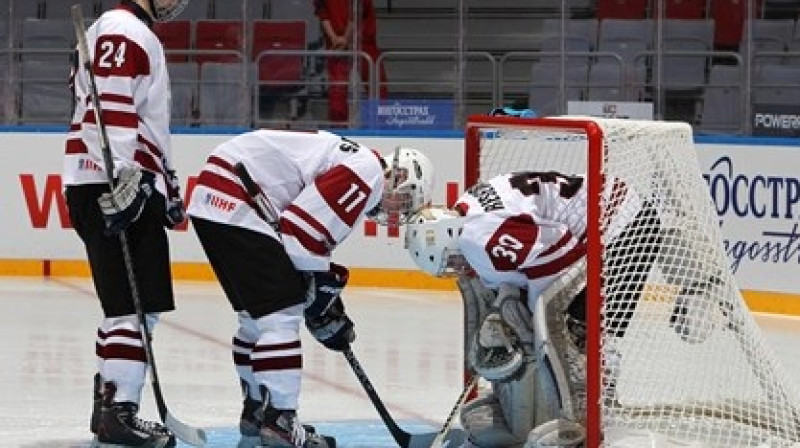 Olafs Aploks, Edgars Homjakovs un Maksims Rešetņikovs
Foto: Francois Laplante/HHOF-IIHF Images