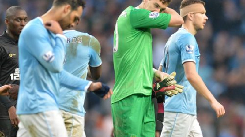 "City" futbolisti vīlušies pamet laukumu
Foto:AFP/Scanpix