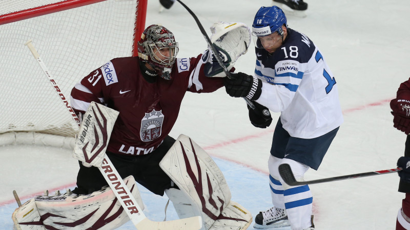 Egars Masaļskis un Tūka Mentile pasaules čempionātā (2014) 
Foto:  ITAR-TASS / Scanpix