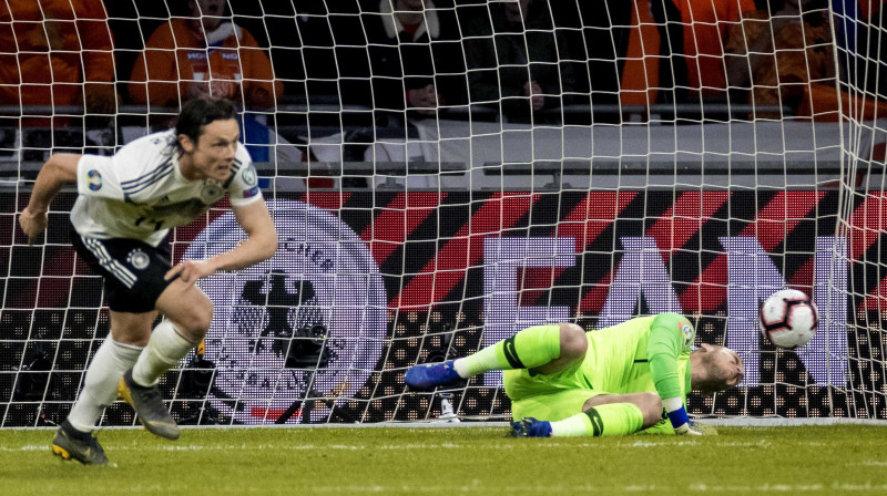 Vācijas izlases futbolists Niko Šulcs pret uzvaras vārtu gūšanas pret Nīderlandi. Foto: EPA/Scanpix